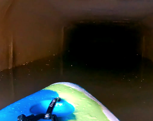 Kayak in tunnel Kayak in tunnel