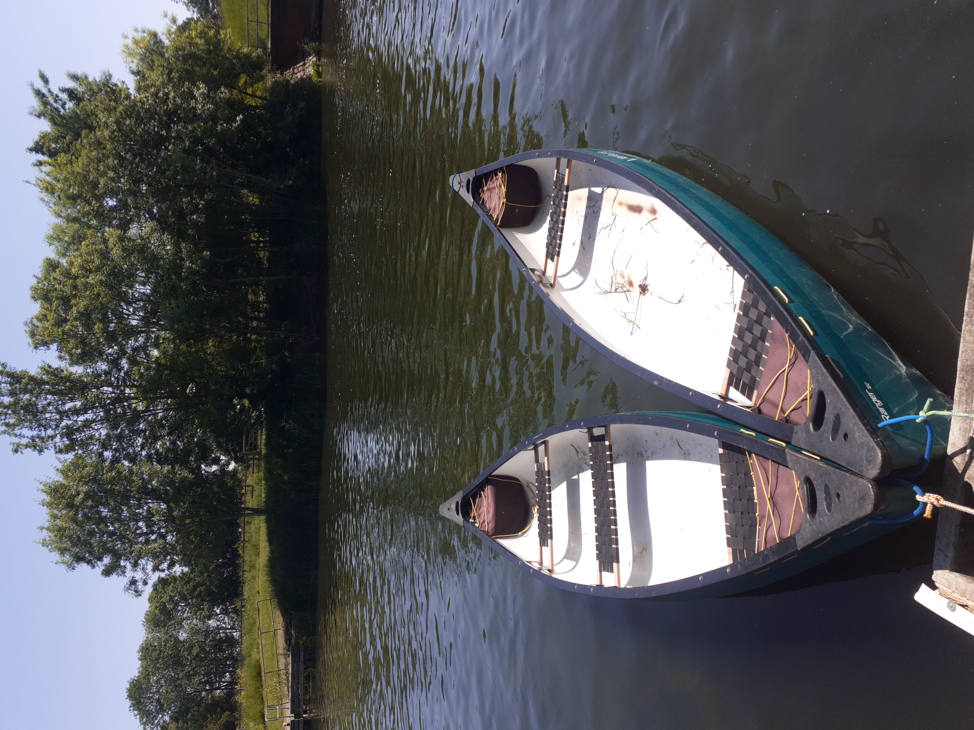 Canoes ready to be paddled on the Great Ouse