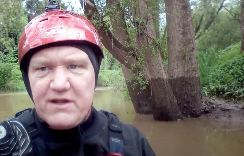 Dave with river level on tree